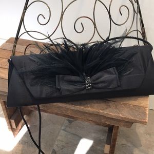 Vintage satin clutch/evening bag with feather detail.